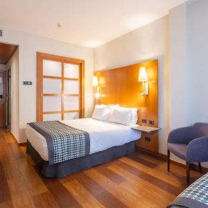 Standard Dreibettzimmer für Gäste mit Behinderungen